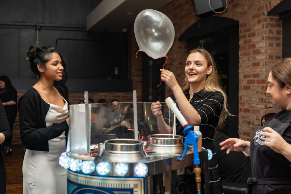 Two International Students having fun with bubble making